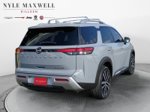 2023 Nissan Pathfinder Platinum — Boulder Gray interior and detail view 16, for sale at Nyle Maxwell CDJR Killeen in Killeen, TX