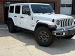 2018 Jeep Wrangler Unlimited Sahara — Bright White Clearcoat exterior view 2, for sale at Velocity Auto Source in RICHMOND, KY