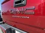 2021 GMC Canyon AT4 w/Cloth — Cayenne Red Tintcoat interior and detail view 10, for sale at Bellingham Nissan in Bellingham, WA