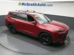 2024 Toyota Grand Highlander Limited — Pearl exterior view 3, for sale at McGrath Ford in Hiawatha, IA