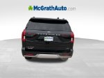 2026 Ford Expedition Max Platinum — Black Metallic exterior view 6, for sale at McGrath Ford in Hiawatha, IA