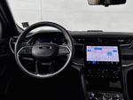 2023 Jeep Grand Cherokee Trailhawk 4xe — Bright White Clearcoat interior and detail view 13, for sale at Legend  Auto Sales in Puyallup, WA