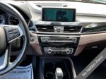 2019 BMW X2 sDrive28i — Black Sapphire Metallic exterior view 6, for sale at A Better Way Wholesale Autos in Naugatuck, CT