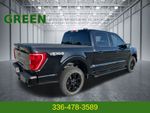 2023 Ford F-150 XLT — Black Metallic exterior view 5, for sale at Green Ford in Greensboro, NC