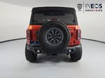2022 Ford Bronco Wildtrak — Chili Pepper Red exterior view 8, for sale at RDS Ineos Grenadier in Devon, PA
