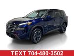 2024 Nissan Rogue SV - Deep Ocean Blue exterior view 1