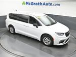 2024 Chrysler Pacifica Touring L — Bright White Clearcoat exterior view 3, for sale at McGrath Ford in Hiawatha, IA