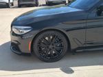 2018 BMW 5 Series M550i xDrive - Black Sapphire Metallic exterior view 11