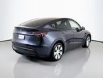 2024 Tesla Model Y - Stealth Gray exterior view 4
