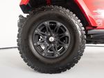 2015 Jeep Wrangler Unlimited Freedom Edition — Red interior and detail view 9, for sale at RDS Ineos Grenadier in Devon, PA