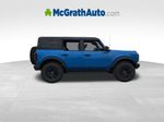 2026 Ford Bronco Badlands — Blue Metallic exterior view 3, for sale at McGrath Ford in Hiawatha, IA