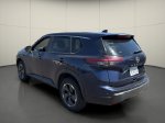 2024 Nissan Rogue SV — Deep Ocean Blue exterior view 5, for sale at Courtesy Nissan of Mesa in Mesa, AZ