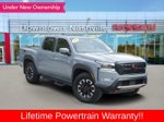 2024 Nissan Frontier PRO-4X — Boulder Gray primary exterior view, for sale at Downtown Nashville Nissan in Nashville, TN