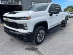 2024 Chevrolet Silverado 2500HD Custom — Summit White exterior view 3, for sale at Tecforce Automotive in Bridgeport, NY