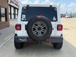 2018 Jeep Wrangler Unlimited Sahara — Bright White Clearcoat exterior view 4, for sale at Velocity Auto Source in RICHMOND, KY