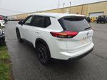 2025 Nissan Rogue SV — White Pearl exterior view 4, for sale at McGrath Ford in Hiawatha, IA
