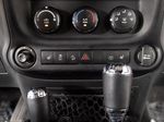 2015 Jeep Wrangler Unlimited Freedom Edition — Red interior and detail view 19, for sale at RDS Ineos Grenadier in Devon, PA