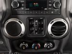 2015 Jeep Wrangler Unlimited Freedom Edition — Red interior and detail view 17, for sale at RDS Ineos Grenadier in Devon, PA