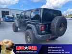 2024 Jeep Wrangler Rubicon — Black Clearcoat exterior view 6, for sale at Autostar CDJR of Hendersonville in Hendersonville, NC