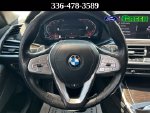 2021 BMW X7 xDrive40i — Alpine White interior and detail view 16, for sale at Green Ford in Greensboro, NC
