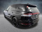 2026 Lincoln Aviator Reserve — Black Metallic exterior view 4, for sale at Lincoln of Bloomington in Bloomington, MN
