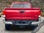 2016 Toyota Tacoma TRD Off-Road — Barcelona Red Metallic exterior view 4, for sale at A Better Way Wholesale Autos in Naugatuck, CT
