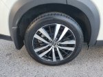 2024 Nissan Pathfinder Platinum — Pearl White exterior view 5, for sale at Downtown Nashville Nissan in Nashville, TN