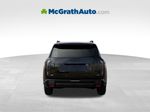 2027 Kia Telluride Hybrid X-Line SX Prestige — Ebony Black exterior view 6, for sale at McGrath Ford in Hiawatha, IA