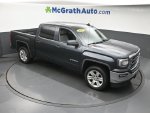 2017 GMC Sierra 1500 SLE — Dark Slate Metallic exterior view 3, for sale at McGrath Ford in Hiawatha, IA