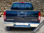 2013 Nissan Frontier SV - Super Black exterior view 4