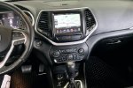 2015 Jeep Cherokee Trailhawk — Deep Cherry Red Crystal Pearlcoat interior and detail view 9, for sale at Lakeside Automotive Group in Spring Lake, MI