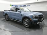 2024 Ford Ranger Lariat — Azure Gray Metallic exterior view 2, for sale at McGrath Ford in Hiawatha, IA