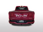 2026 Ram 1500 Big Horn/Lone Star — Molten Red exterior view 4, for sale at Ryan CDJR Buffalo in Buffalo, MN