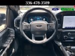 2023 Ford F-150 Lariat — Black Metallic interior and detail view 15, for sale at Green Ford in Greensboro, NC