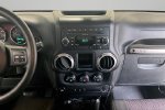 2011 Jeep Wrangler Sport — Bright Silver Metallic interior and detail view 9, for sale at Lakeside Automotive Group in Spring Lake, MI