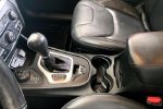 2015 Jeep Cherokee Trailhawk — Deep Cherry Red Crystal Pearlcoat interior and detail view 18, for sale at Lakeside Automotive Group in Spring Lake, MI