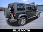 2012 Jeep Wrangler Unlimited Unlimited Rubicon - Black Clearcoat exterior view 4