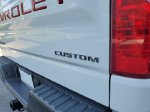 2025 Chevrolet Silverado 1500 Custom Trail Boss — Summit White exterior view 7, for sale at Downtown Nashville Nissan in Nashville, TN