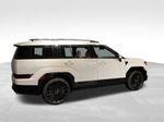 2027 Hyundai Santa Fe Calligraphy — White exterior view 5, for sale at McGrath Ford in Hiawatha, IA
