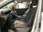 2026 Hyundai Tucson Hybrid SEL — White Pearl interior and detail view 10, for sale at McGrath Ford in Hiawatha, IA