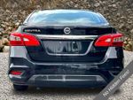 2017 Nissan Sentra S — Super Black exterior view 3, for sale at A Better Way Wholesale Autos in Naugatuck, CT
