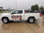 2022 Nissan Frontier SV — Glacier White exterior view 5, for sale at McGrath Ford in Hiawatha, IA