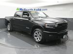2025 Ram 1500 Big Horn/Lone Star — Diamond Black exterior view 2, for sale at McGrath Ford in Hiawatha, IA