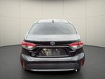 2022 Toyota Corolla Hybrid LE — Black Sand Pearl exterior view 6, for sale at Courtesy Nissan of Mesa in Mesa, AZ