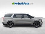 2027 Kia Carnival EX — Ivory interior and detail view 9, for sale at McGrath Ford in Hiawatha, IA