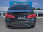 2018 BMW 5 Series M550i xDrive - Black Sapphire Metallic exterior view 5