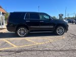 2020 Cadillac Escalade Luxury — Black Raven exterior view 5, for sale at Williams Brothers Dodge Chrysler Jeep Ram of Dundee in Dundee, MI