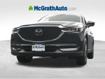 2019 Mazda CX-5 Touring — Jet Black exterior view 7, for sale at McGrath Ford in Hiawatha, IA