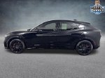 2023 Ford Mustang Mach-E GT — Shadow Black exterior view 3, for sale at Lincoln of Bloomington in Bloomington, MN
