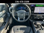 2024 Ford F-150 Lariat — Black Metallic interior and detail view 15, for sale at Green Ford in Greensboro, NC